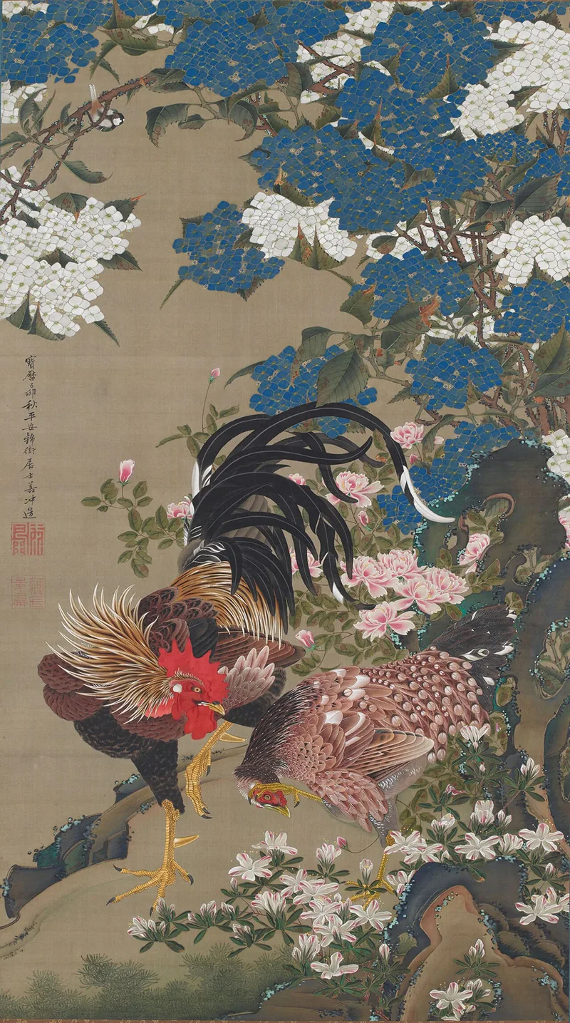 Presentation mockup of Rooster and Hen with Hydrangeas in a thin black frame. A rooster with a red comb and long black tail feathers stands on a rock beside a brown hen, under a bank of blue and white hydrangeas on a grey-brown silk ground.